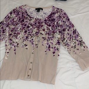 Button down shirt  elbow sleeves. Form fitting